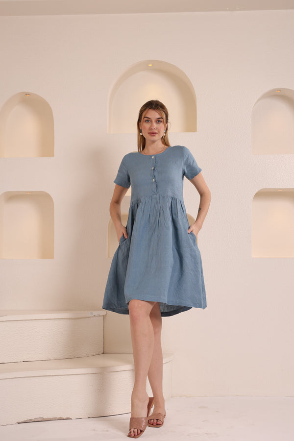 Linen A-line dress with round neckline in solid light blue color 