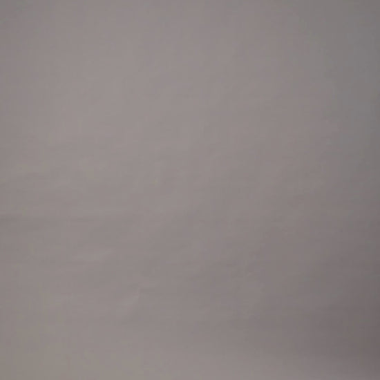 Video featuring an elegant linen occasion dress, highlighting its sophisticated style and flow.