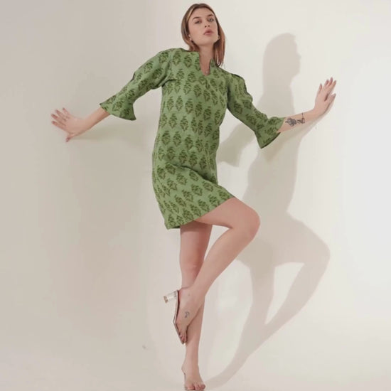 Video showcasing women in playful linen mini dresses, highlighting their breezy and stylish appeal.