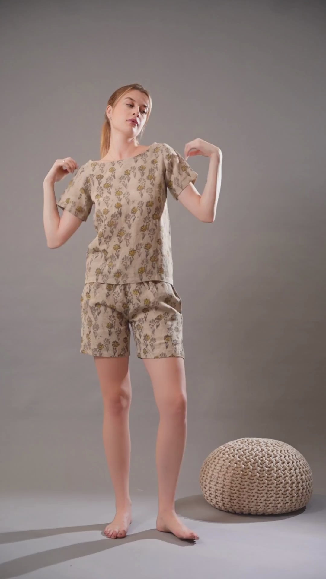 Video featuring a relaxed linen top and shorts outfit, highlighting its breezy and stylish summer look.
